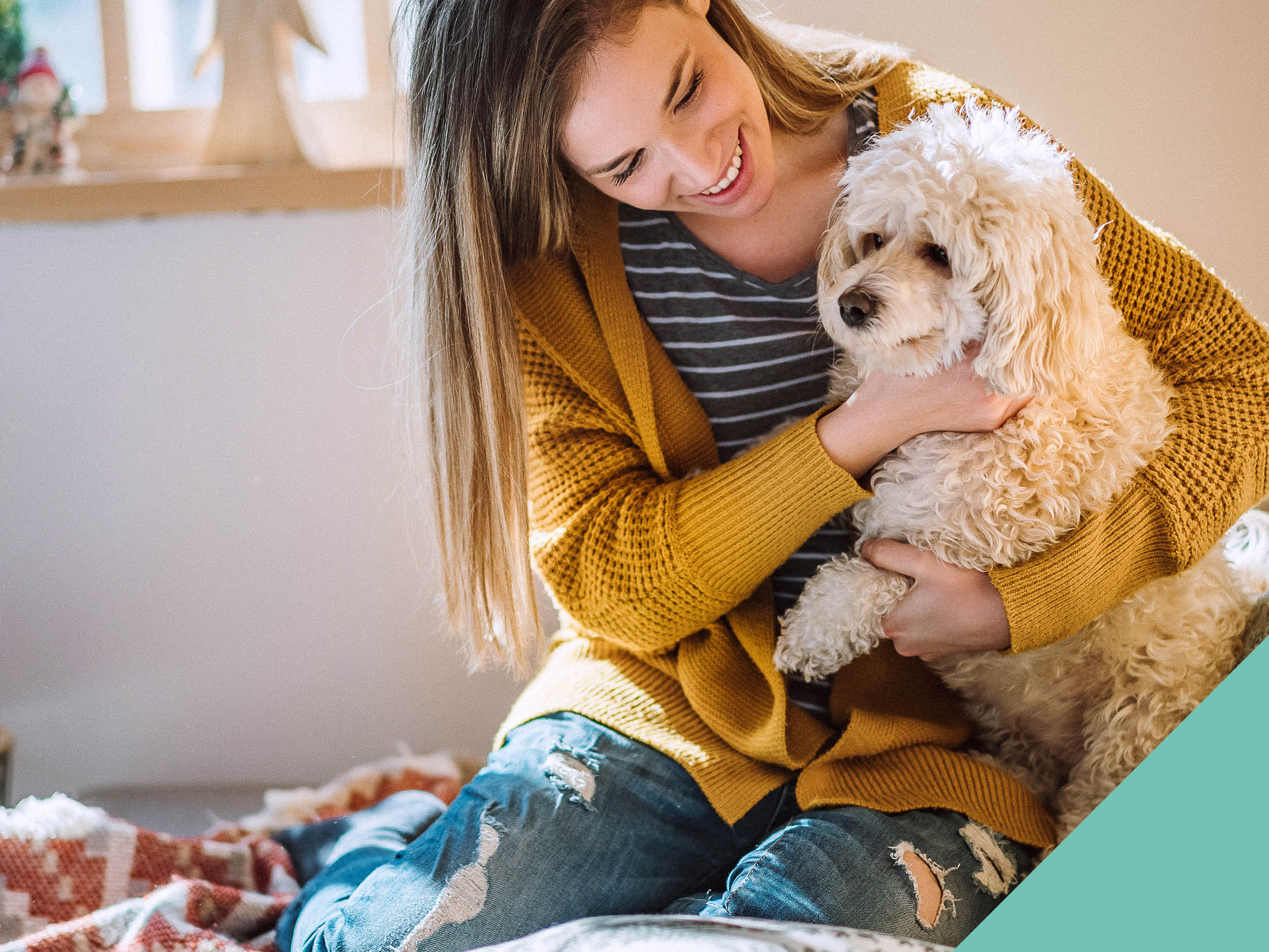 Lady hugging her dog